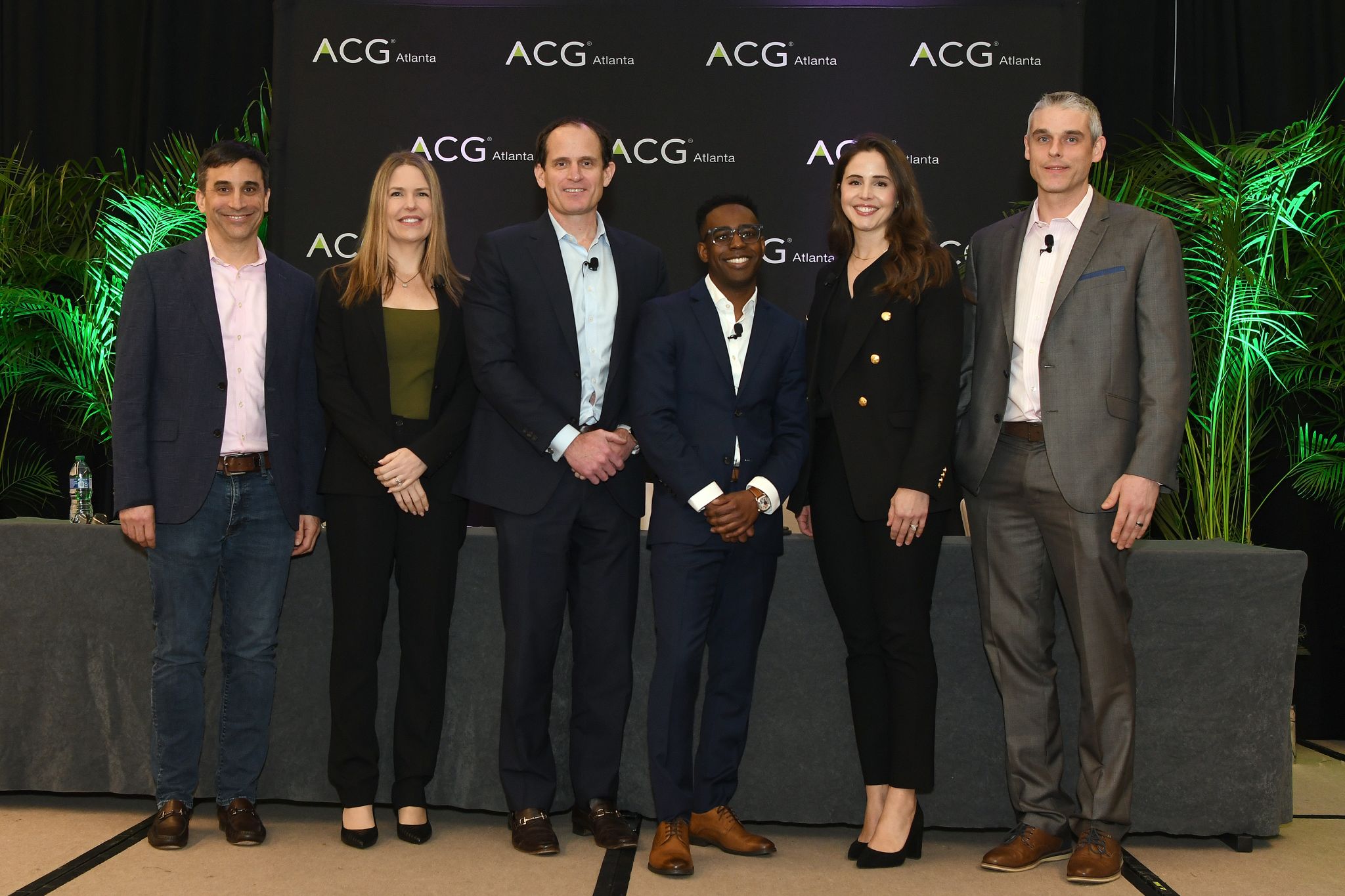 A group photo of ACG attendees at the M&A South 2024 event