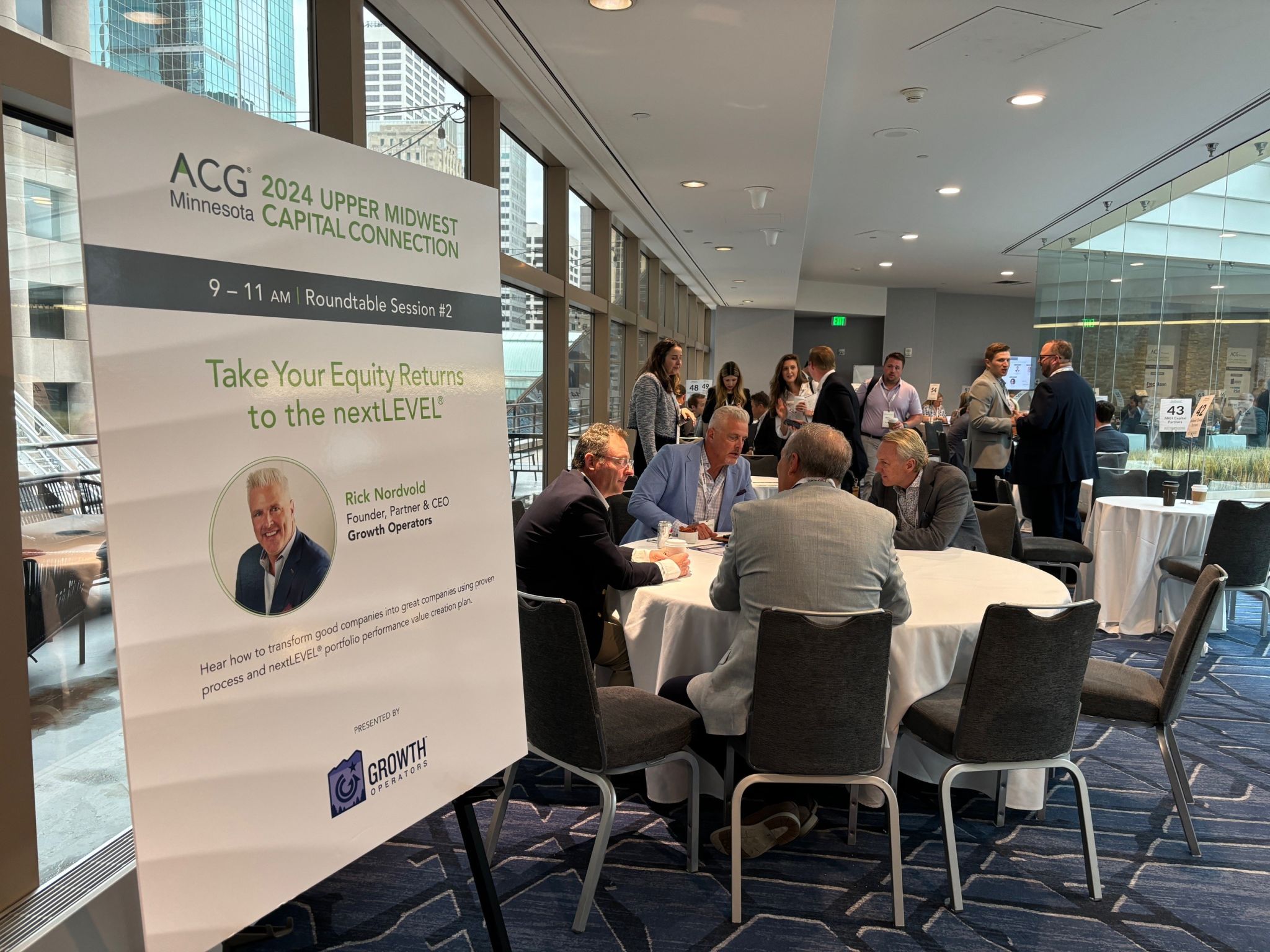 Group discussions at the ACG upper midwest networking event 